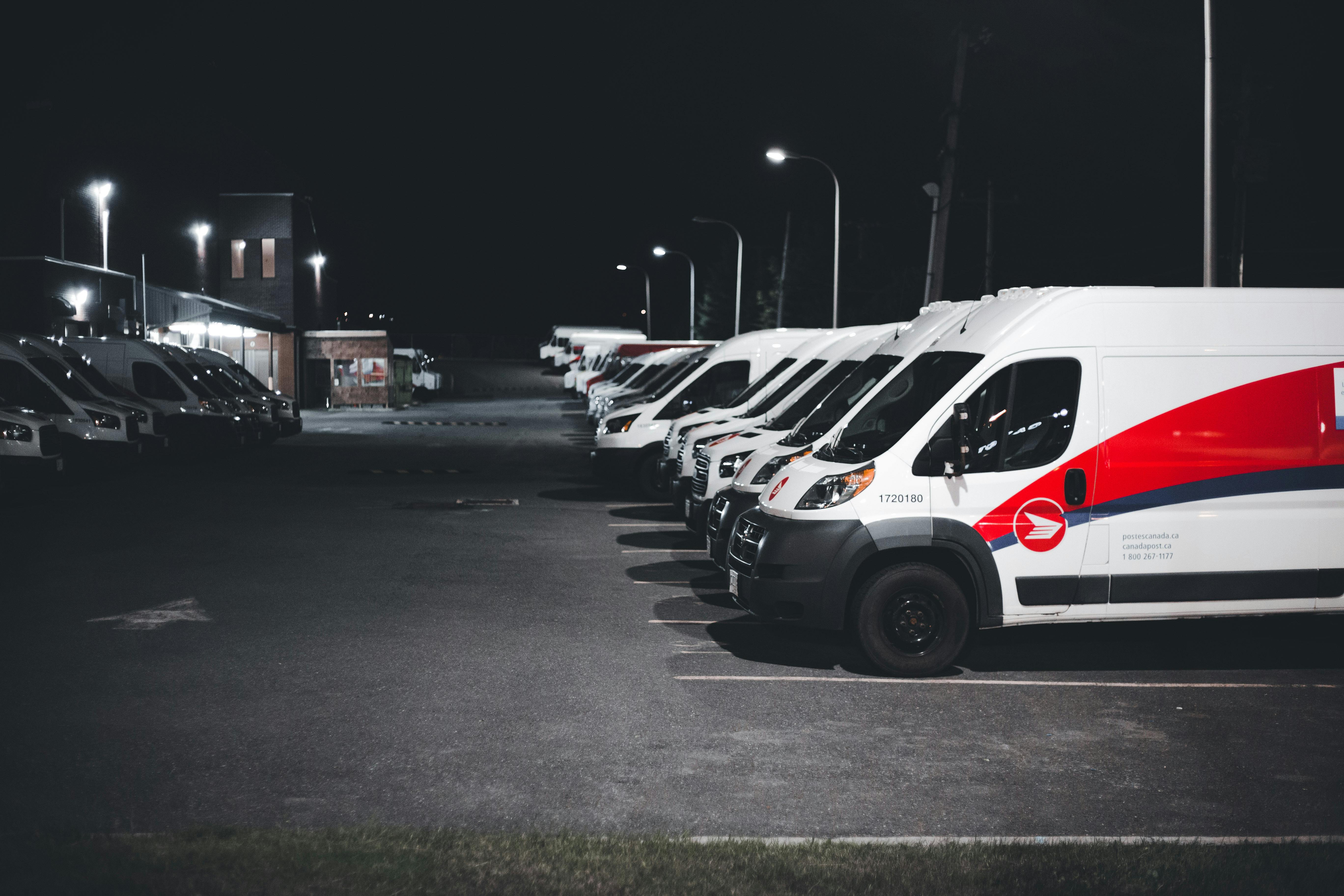 Commercial delivery vans in a fleet lot