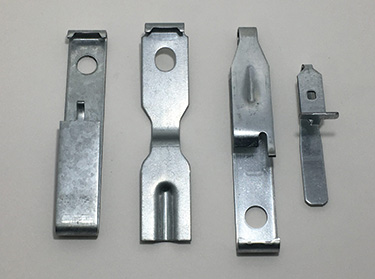 Detail view of precision formed stamping with holes and bends