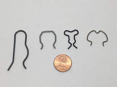 Wire forms and specialty wire components produced by Four-Slide Technology